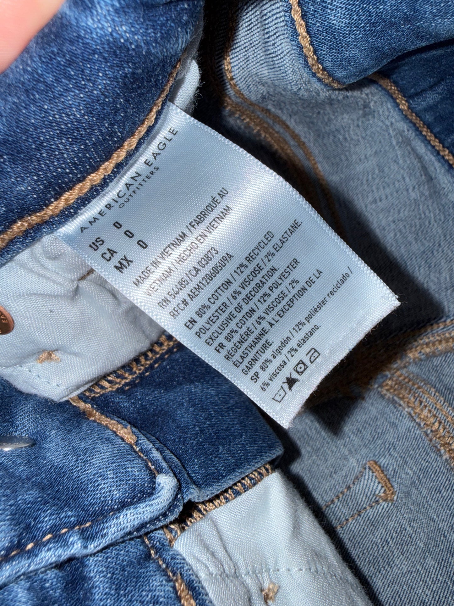 American Eagle (0) Distressed High V-Rise Shortie Jean Shorts