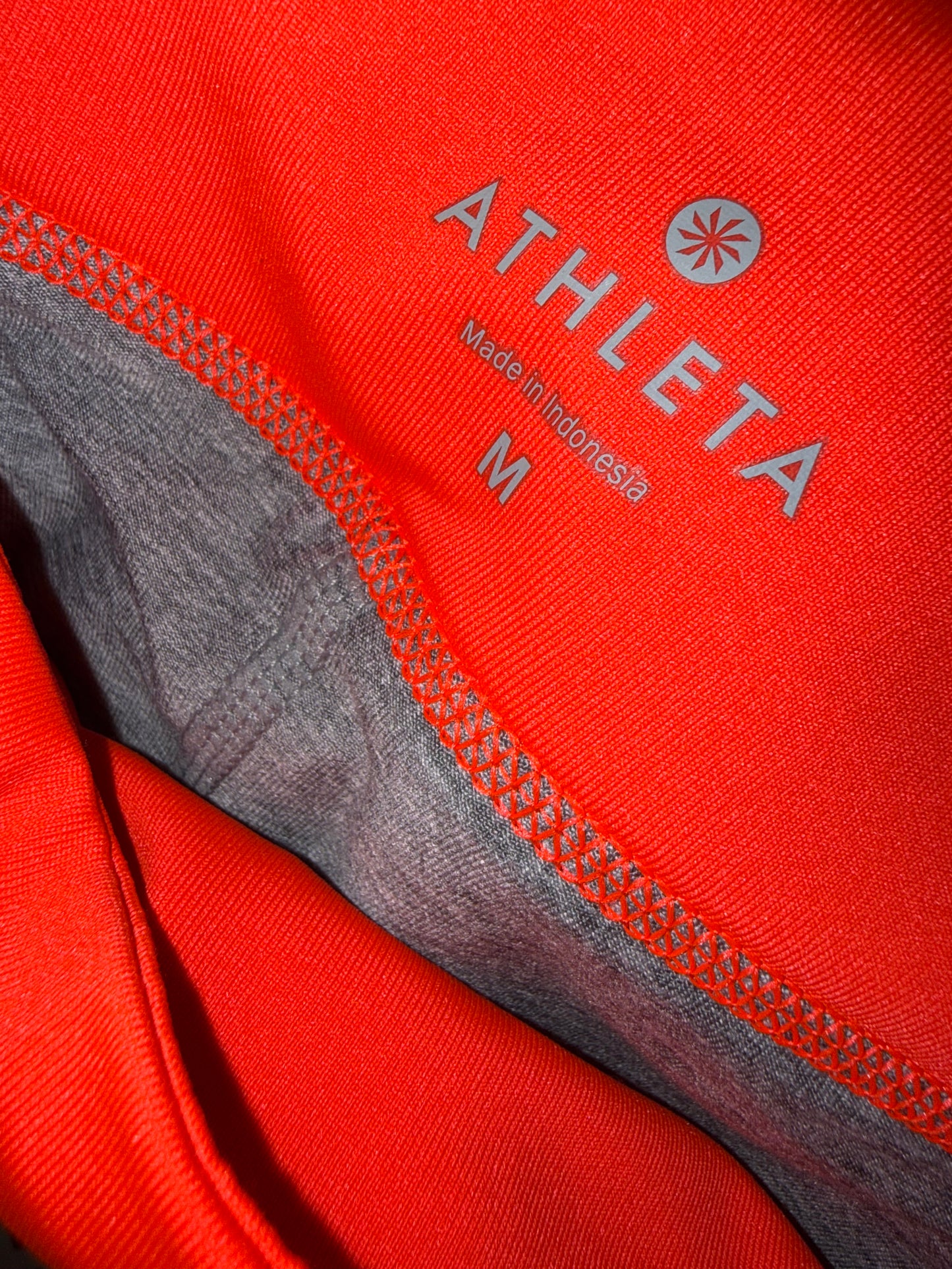 Athleta (Large) Orange Sporty Shorts with Reflective Details