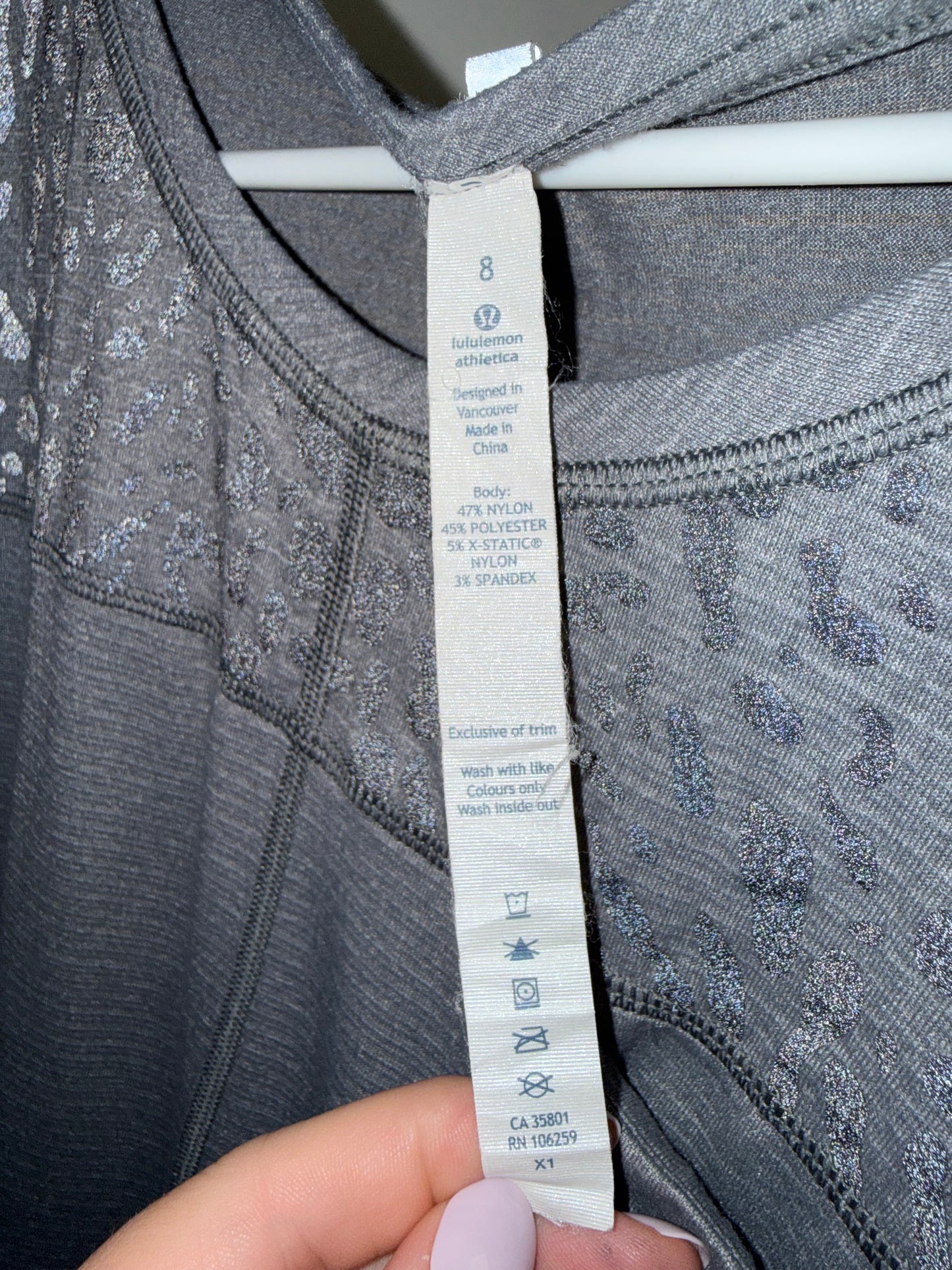 Lululemon (8) Grey Striped and Cheetah Print Pattern Pocket Tee