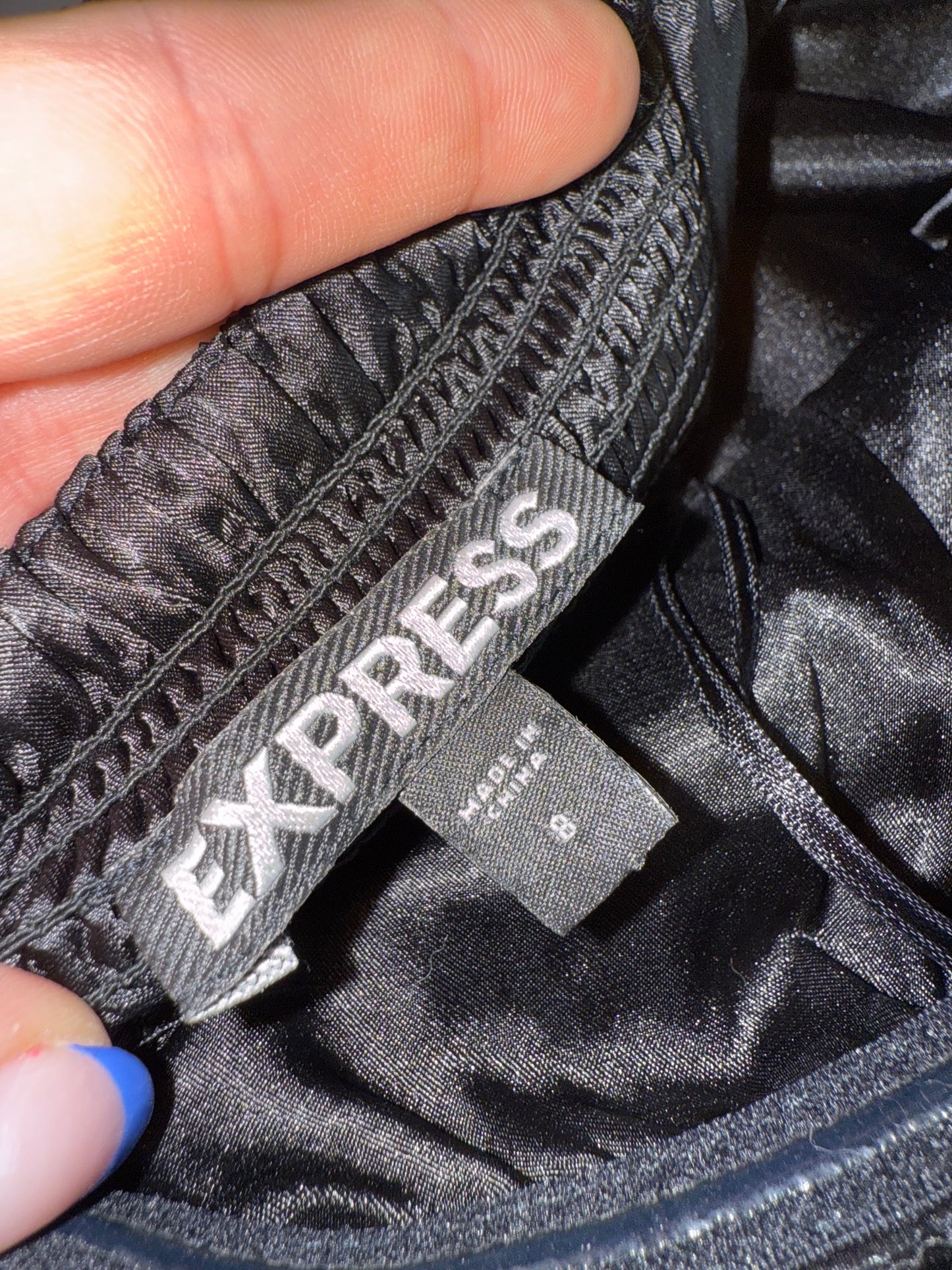 Express (8) Black Sequin Strapless Romper