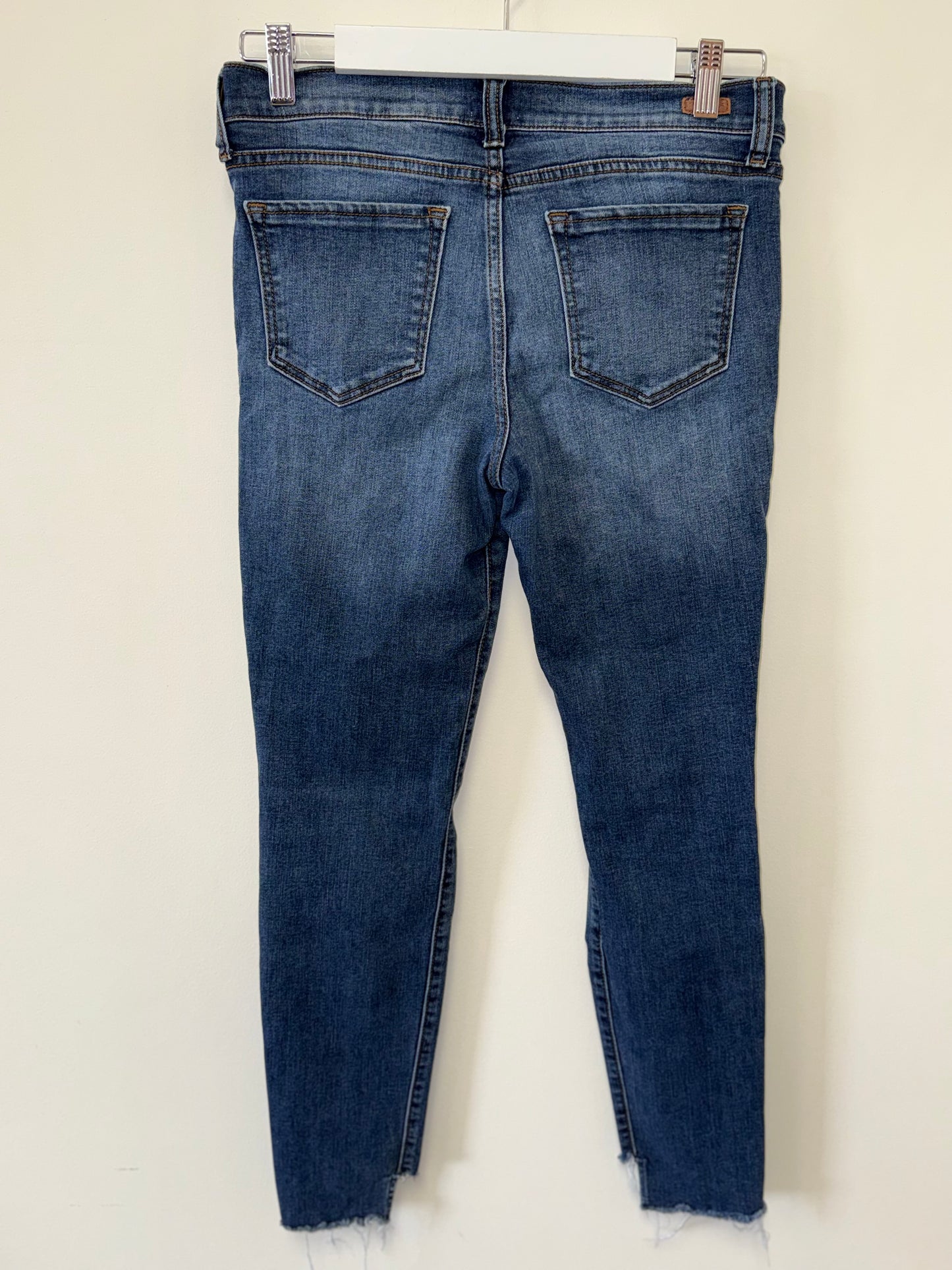 Sneak Peek (7) Low Rise Distressed Denim Skinny Jeans with Raw Hem