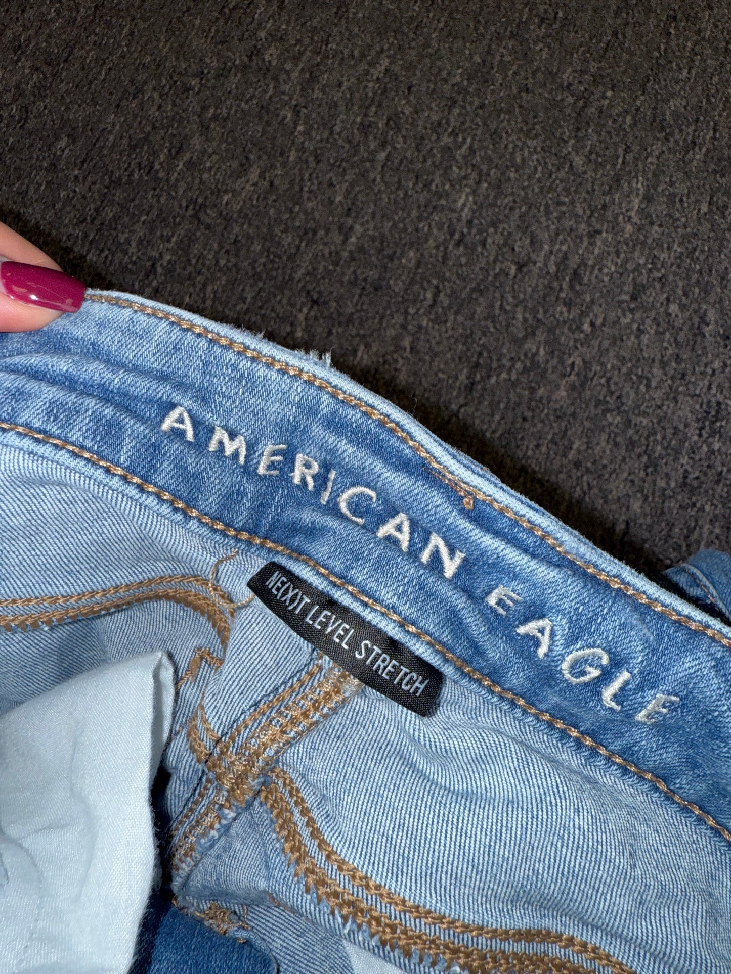 American Eagle (4) Distressed Denim High Rise Shortie Jean Shorts with Stretch