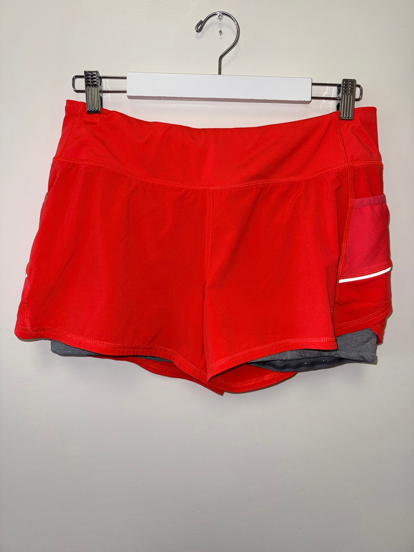 Athleta (Large) Orange Sporty Shorts with Reflective Details