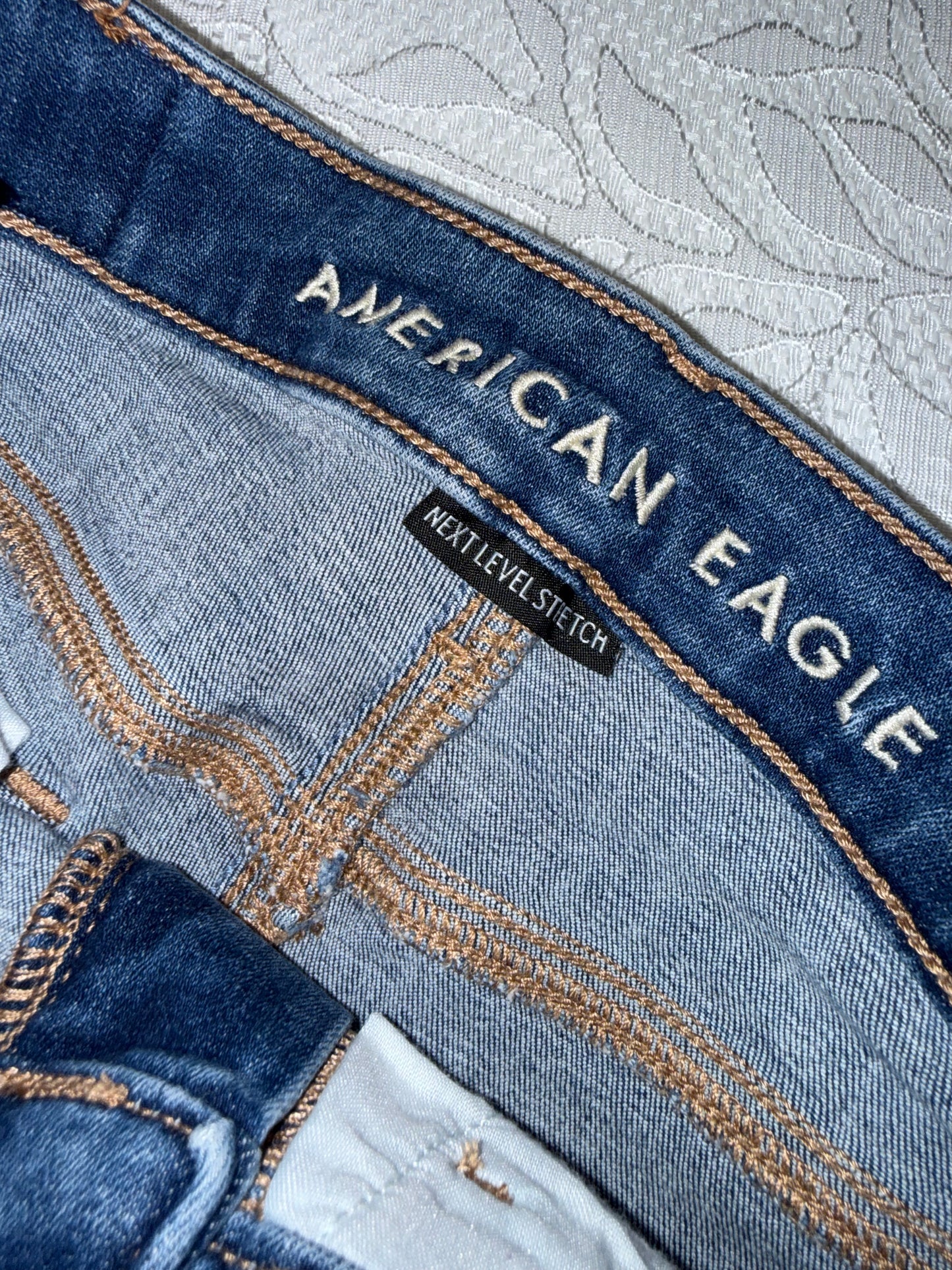 American Eagle (0) Distressed High V-Rise Shortie Jean Shorts