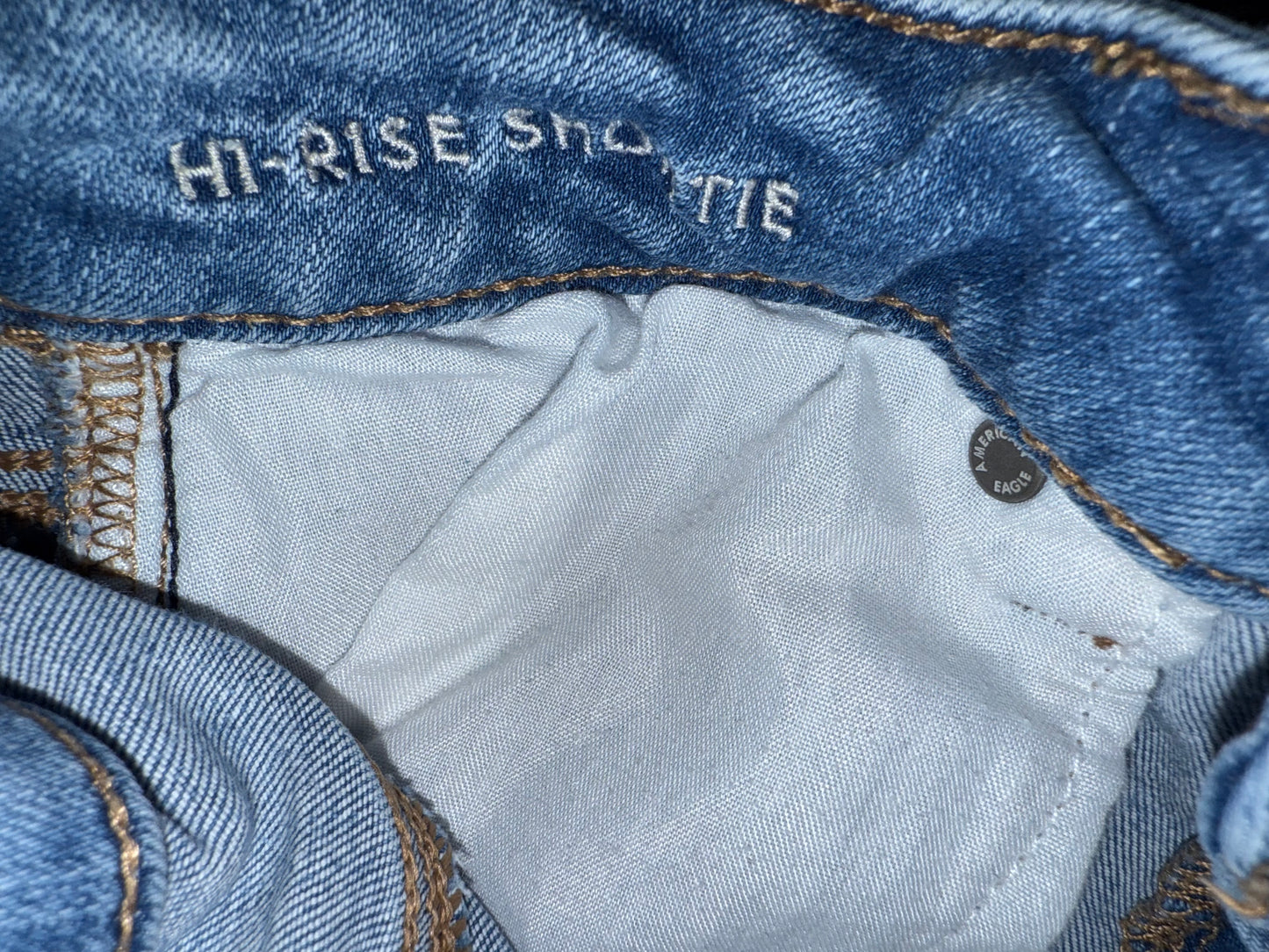 American Eagle (4) Distressed Denim High Rise Shortie Jean Shorts with Stretch