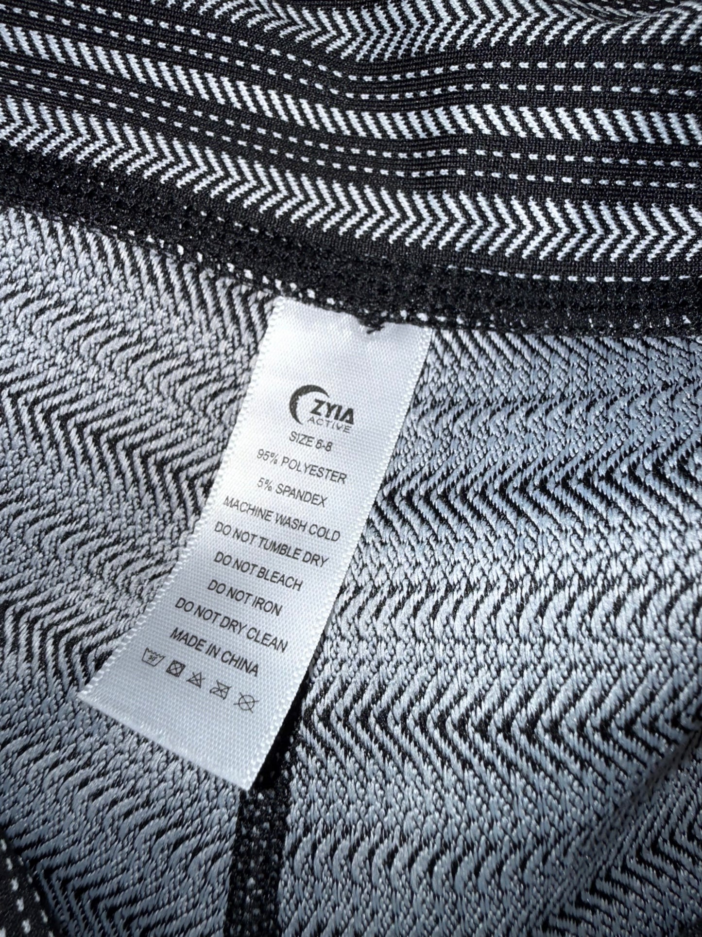 ZYIA (6-8) Black//Grey Striped Cropped Leggings
