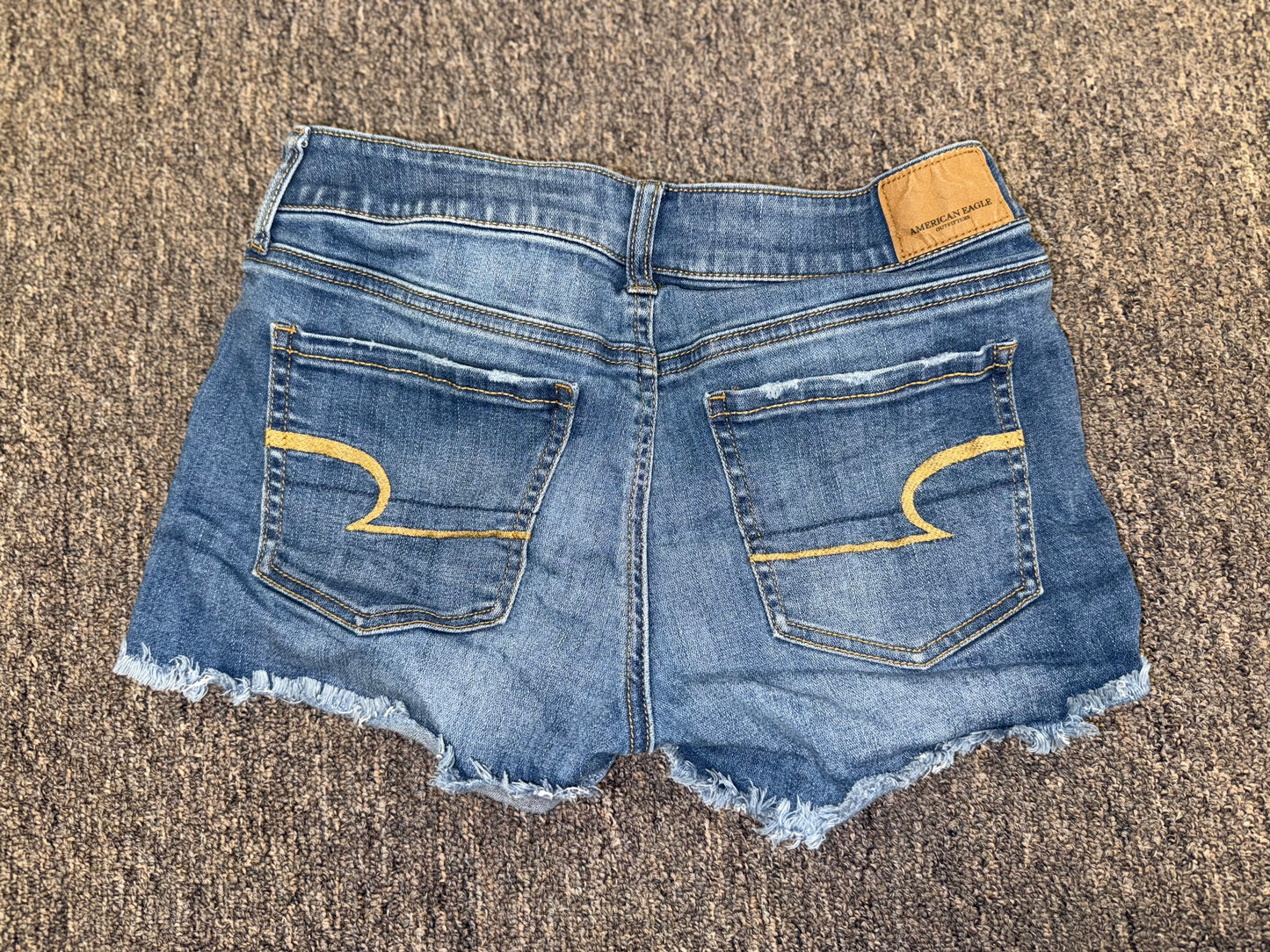 American Eagle (4) Denim Super Stretch X Shortie Jean Shorts with Frayed Hem