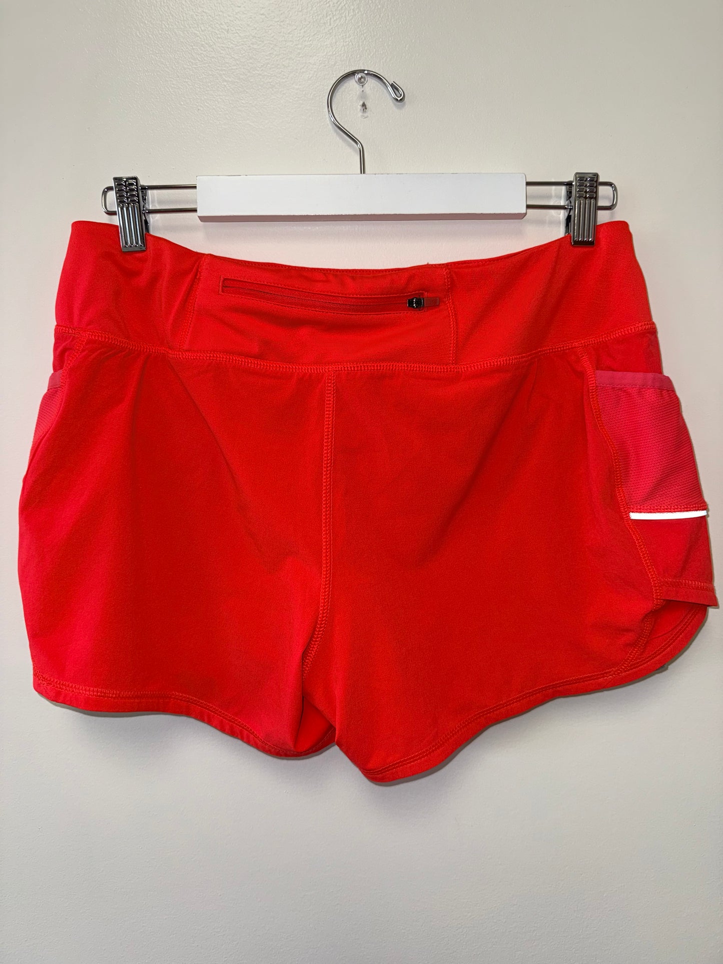 Athleta (Large) Orange Sporty Shorts with Reflective Details