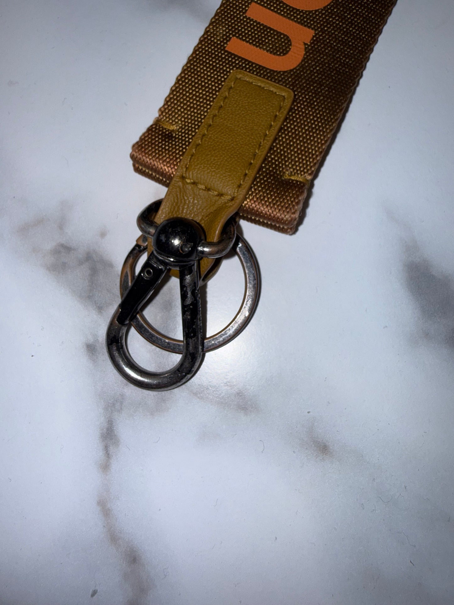 Lululemon Mustard Yellow Key Holder with Orange Logo Font