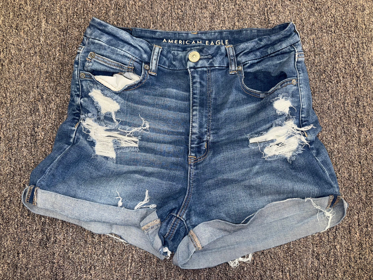 American Eagle (12) Distressed Denim Curvy High Rise Shortie Jean Shorts