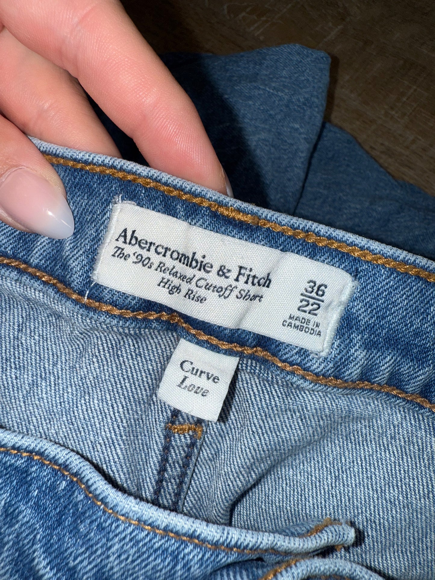 Abercrombie & Fitch (22) The 90's Relaxed Cutoff High Rise Distressed Jean Short